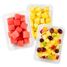 Ananas, mango, watermeloen blokjes of fruitsalade ananas/druif